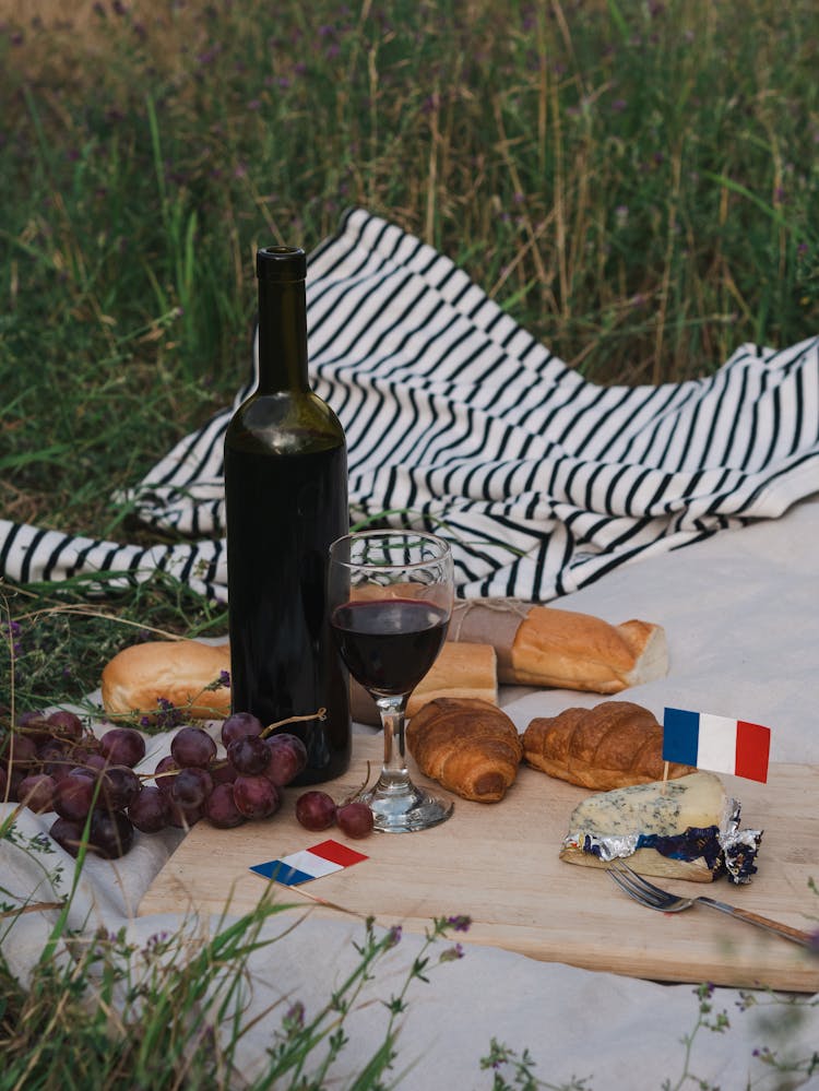 Wine And Food On A Picnic Blanket