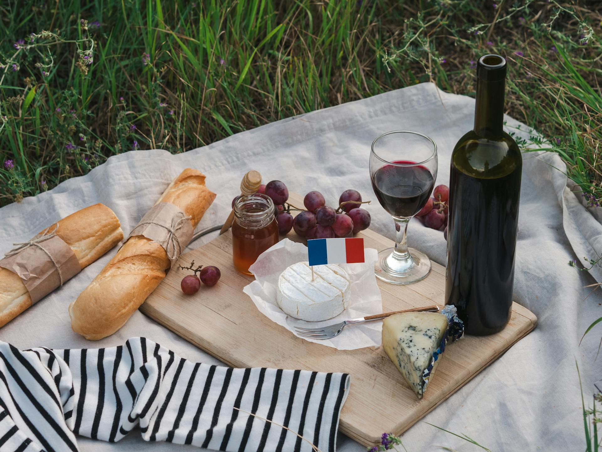 French Traditional Food On Picnic Blanket