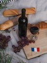 Wine Bottle Beside a Wine Glass