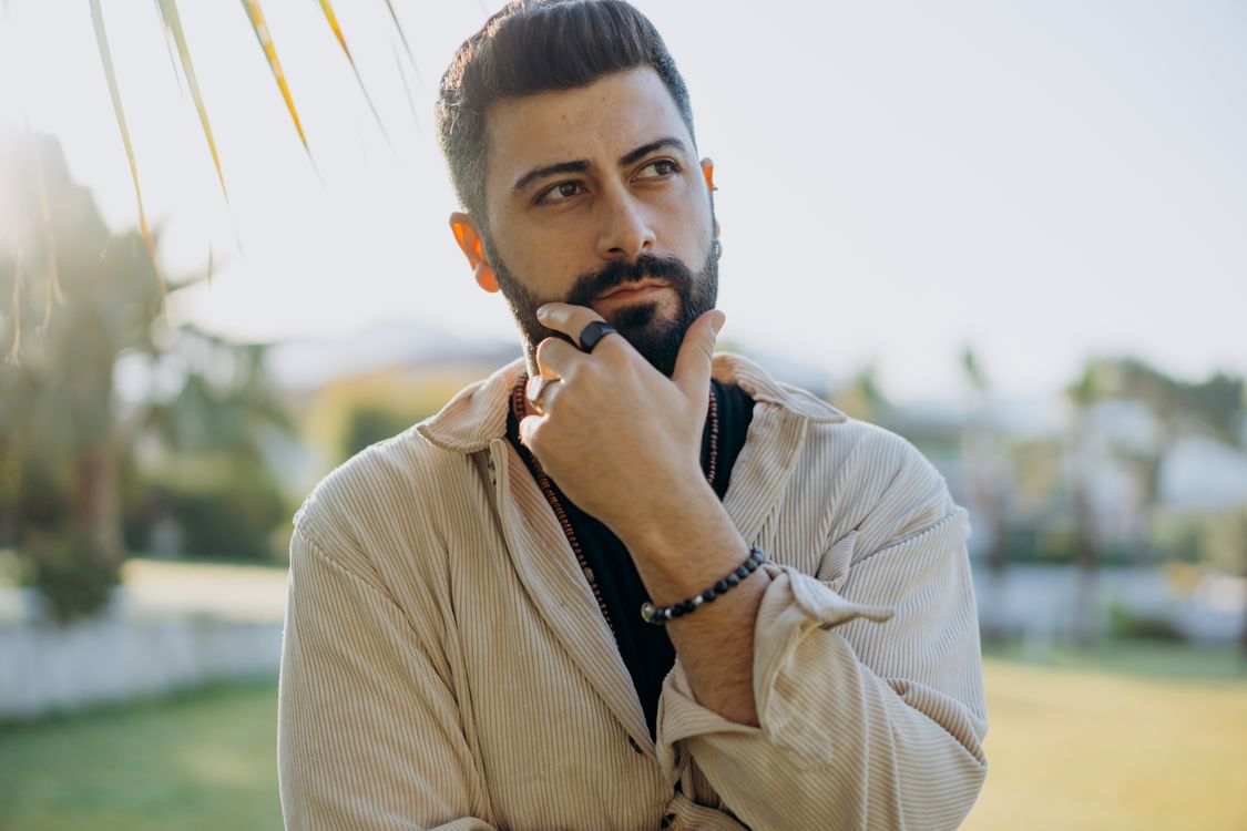 Photo of a Fine Looking Man Having Deep Thoughts · Free Stock Photo