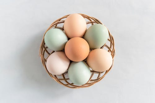 Free White Eggs on Brown Woven Basket Stock Photo
