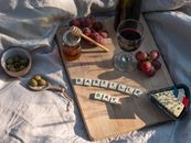 Scrabble Tiles on Wooden Board
