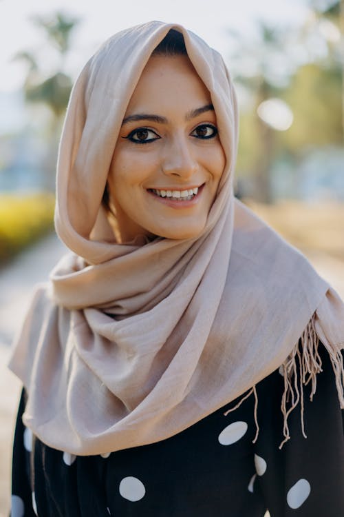 Portrait of a Woman in Beige Hijab