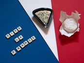 Vive la France theme with French cheeses and flag colors in a creative layout.
