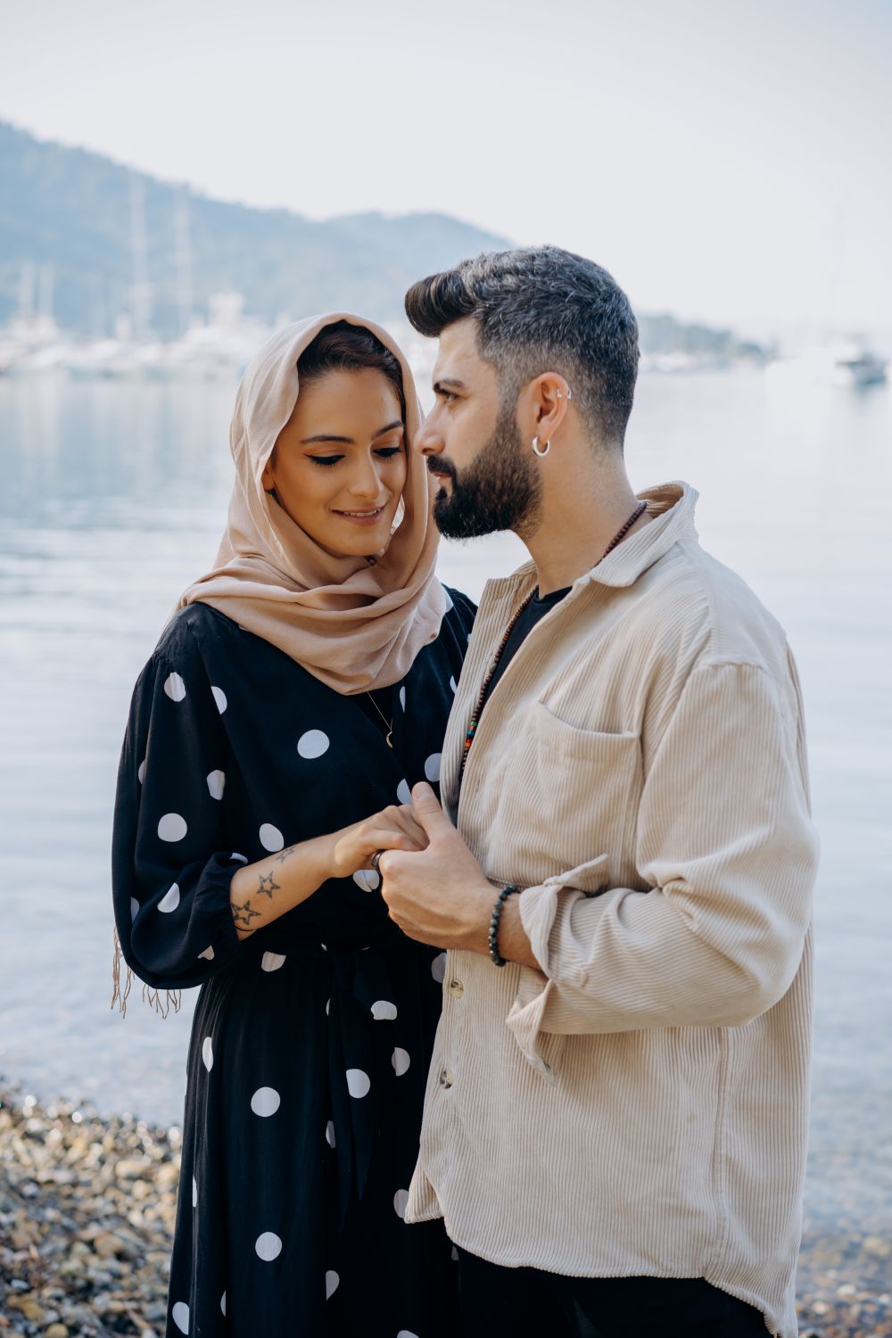 Bearded Man Holding the Hand of a Woman · Free Stock Photo