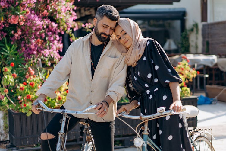 Couple Riding Their Bicycles