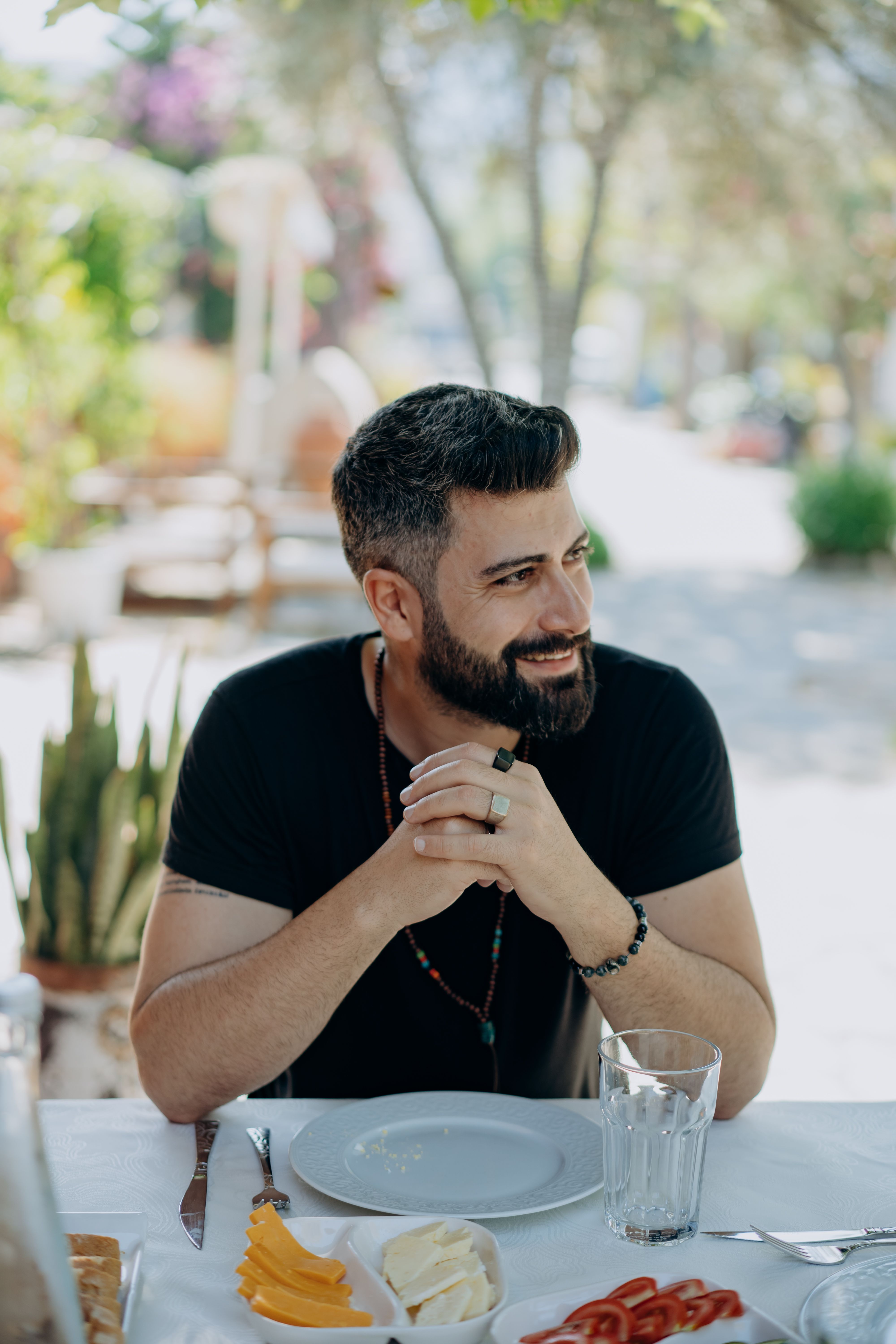 A Bearded Man in Black Shirt on a Date · Free Stock Photo