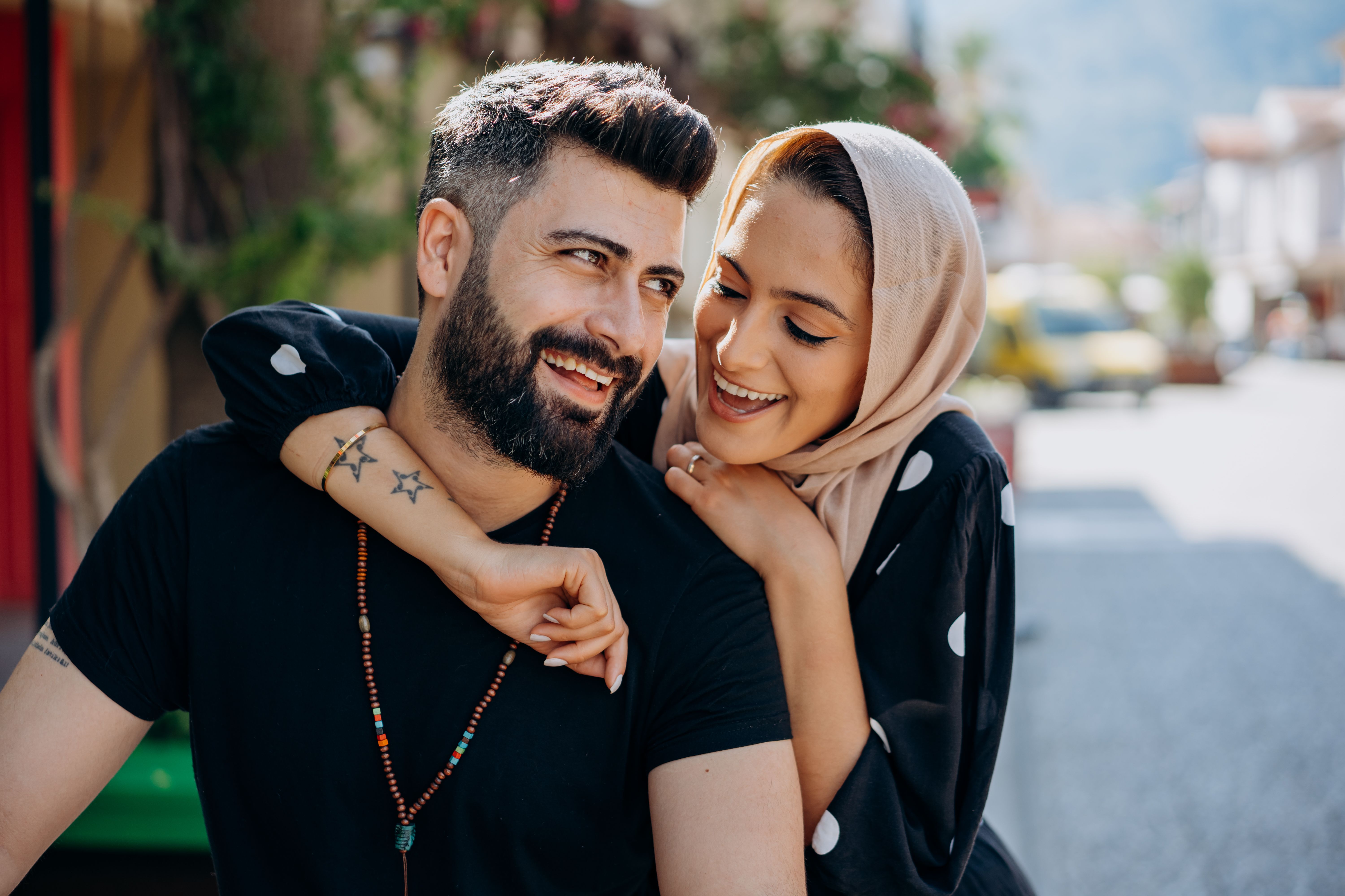 A Woman Hugging a Man From Behind · Free Stock Photo
