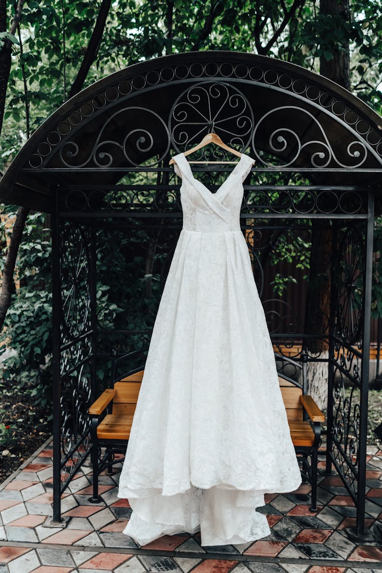 White Wedding Gown Hanging Outdoors