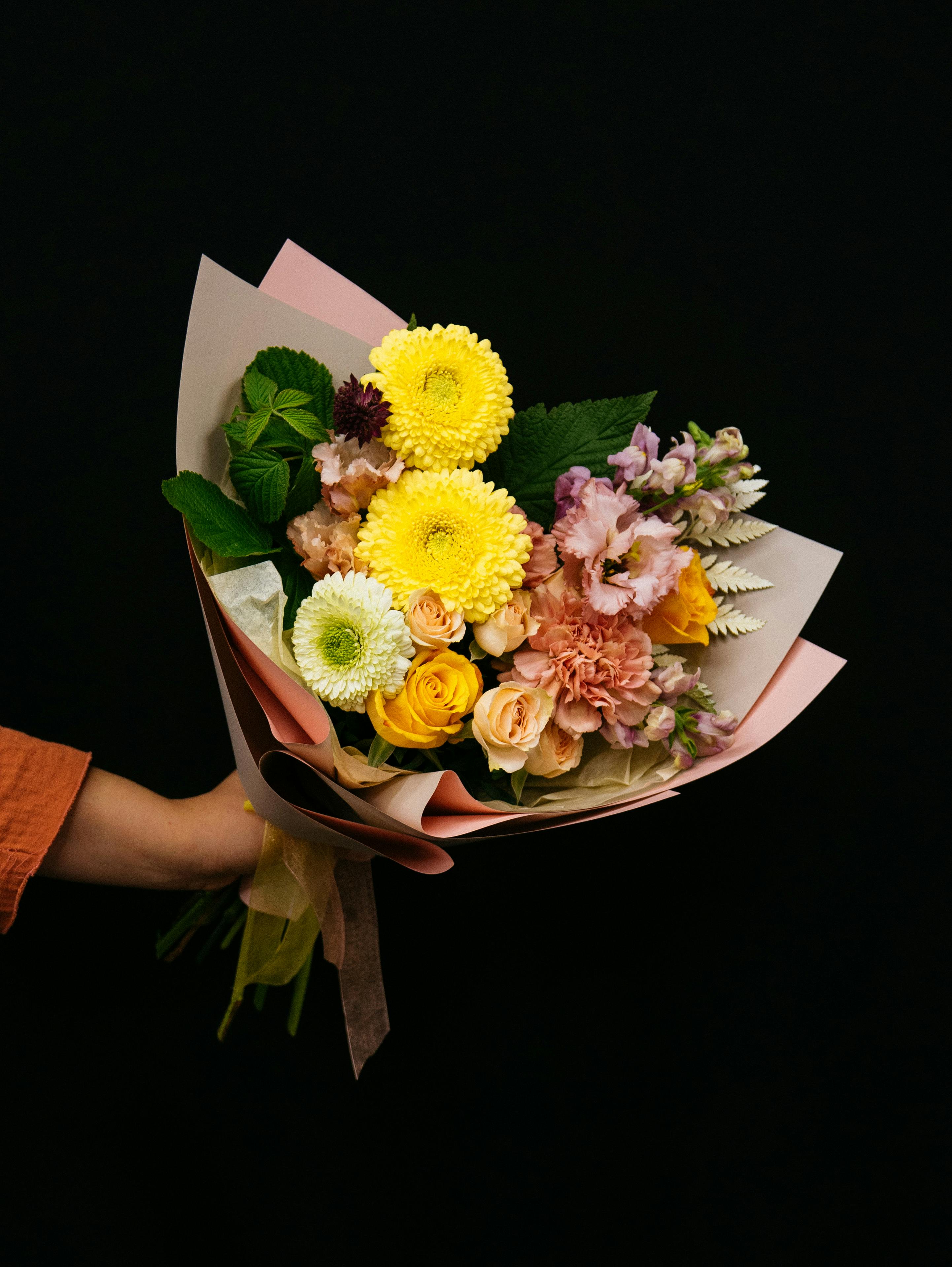 bunch of flowers with black background