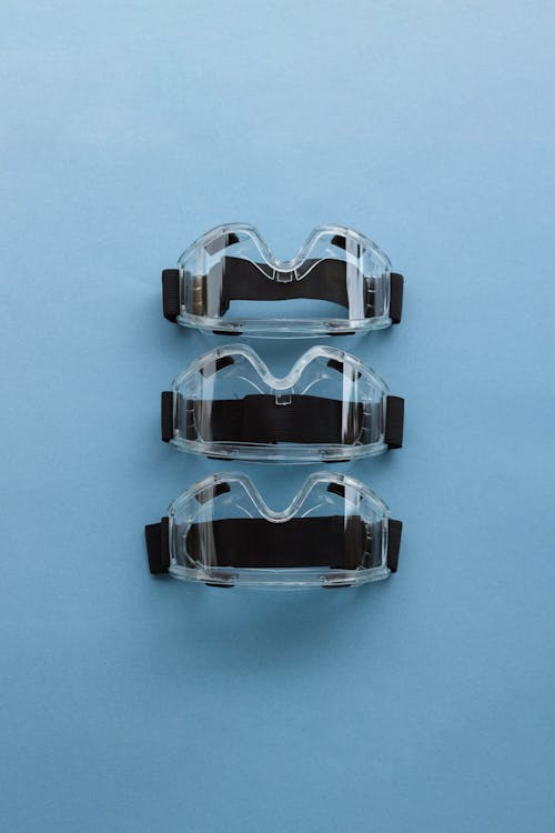 Free Safety Glasses on a Blue Background Stock Photo