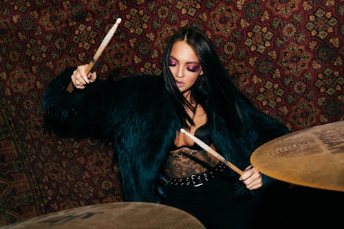 Sexy Woman Playing Drums