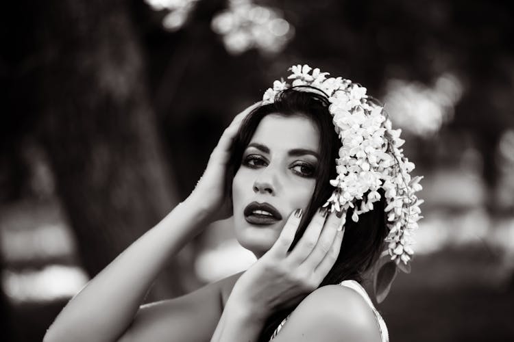 Black And White Portrait Of Woman Wearing Floral Headpiece