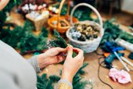 Person Holding Green Garlands