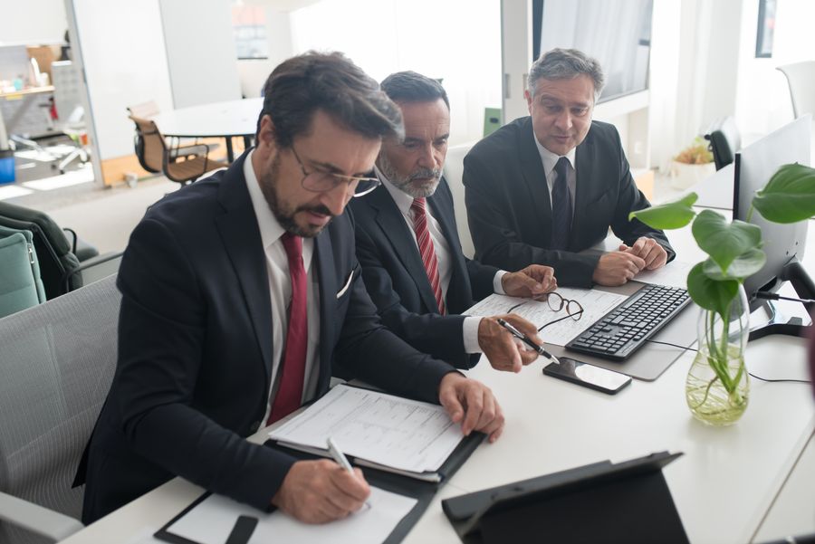 Professionals collaborating in a modern office