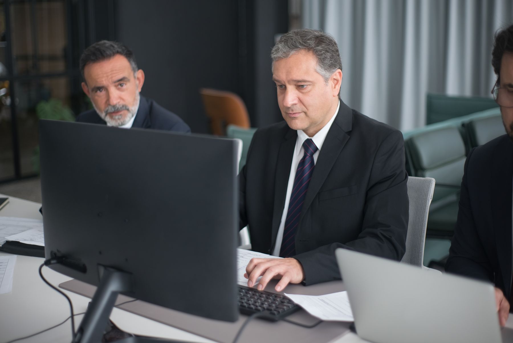 Technology professionals collaborating in an office