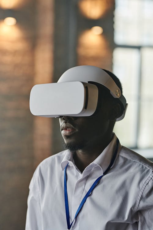 Man in a Dress Shirt Using Virtual Reality Headset
