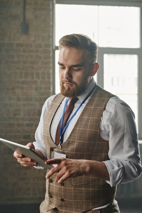 Man Holding a Tablet