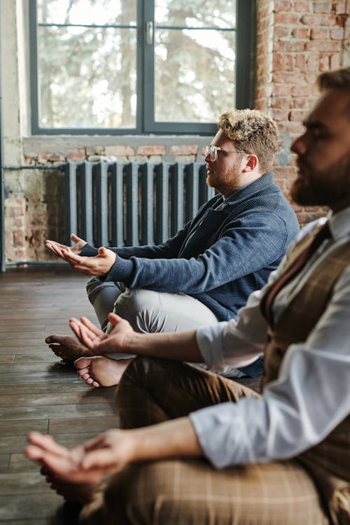 Men Sitting on the Floor