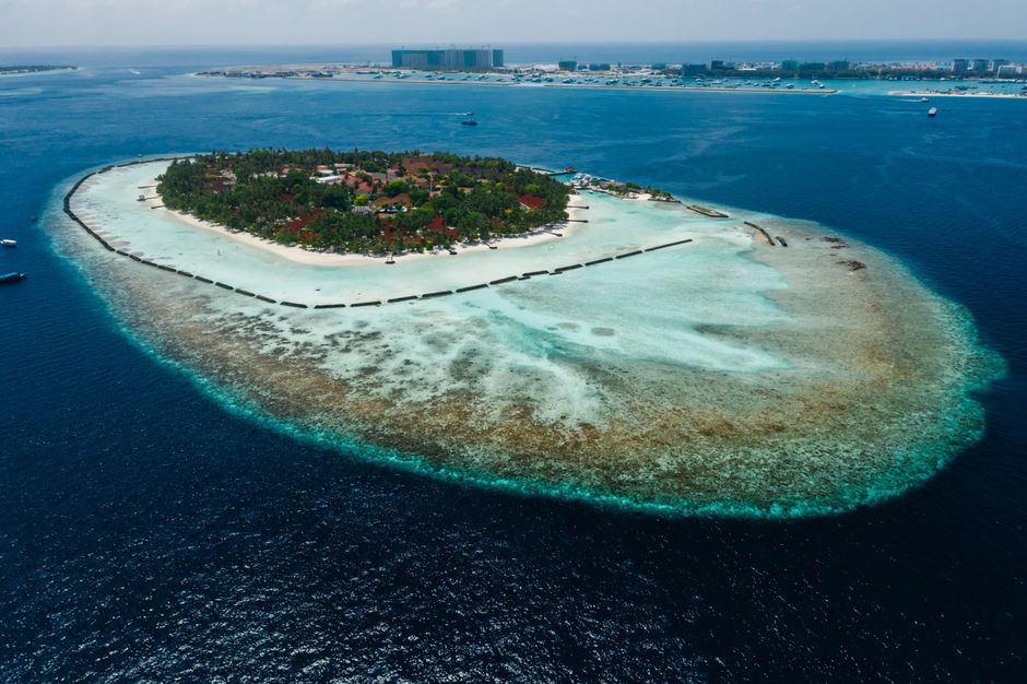 aerial view tropical island beach resort with clear turquoise water