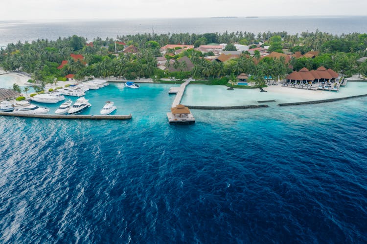 Aerial Shot Of Yachts Parked Near The Resort 