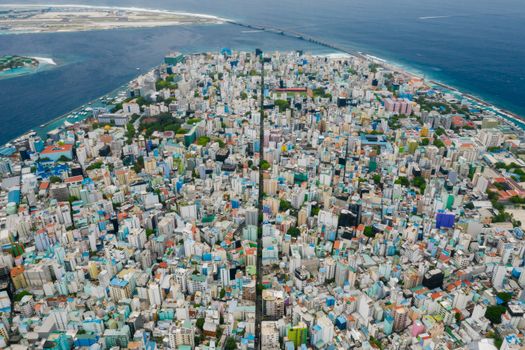 Stunning high-angle aerial view of Malé, the densely populated capital of the Maldives.