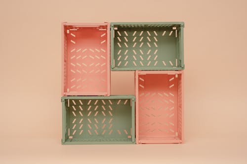 Foldable Storage Crates on Beige Background 