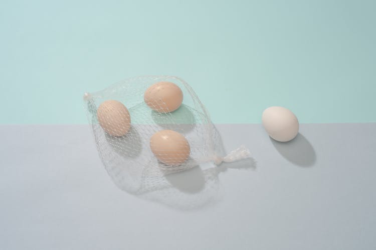 Four Eggs On White Net