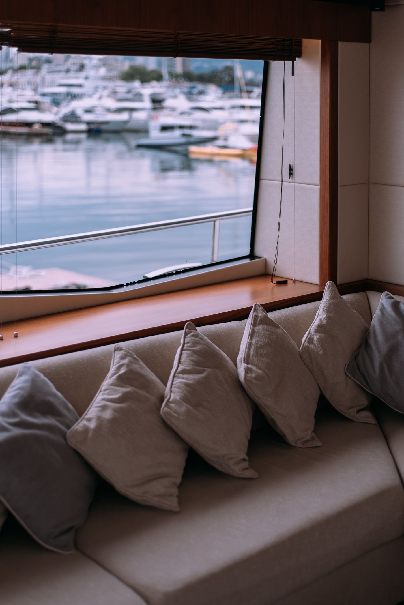 Luxury yacht saloon overlooking a marina