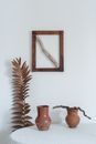 Clay Vase on the White Table