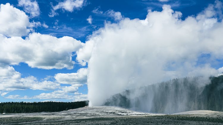 Old Faithful Seen In The Upper Geyser Basin At Yellowstone National Park In Wyoming