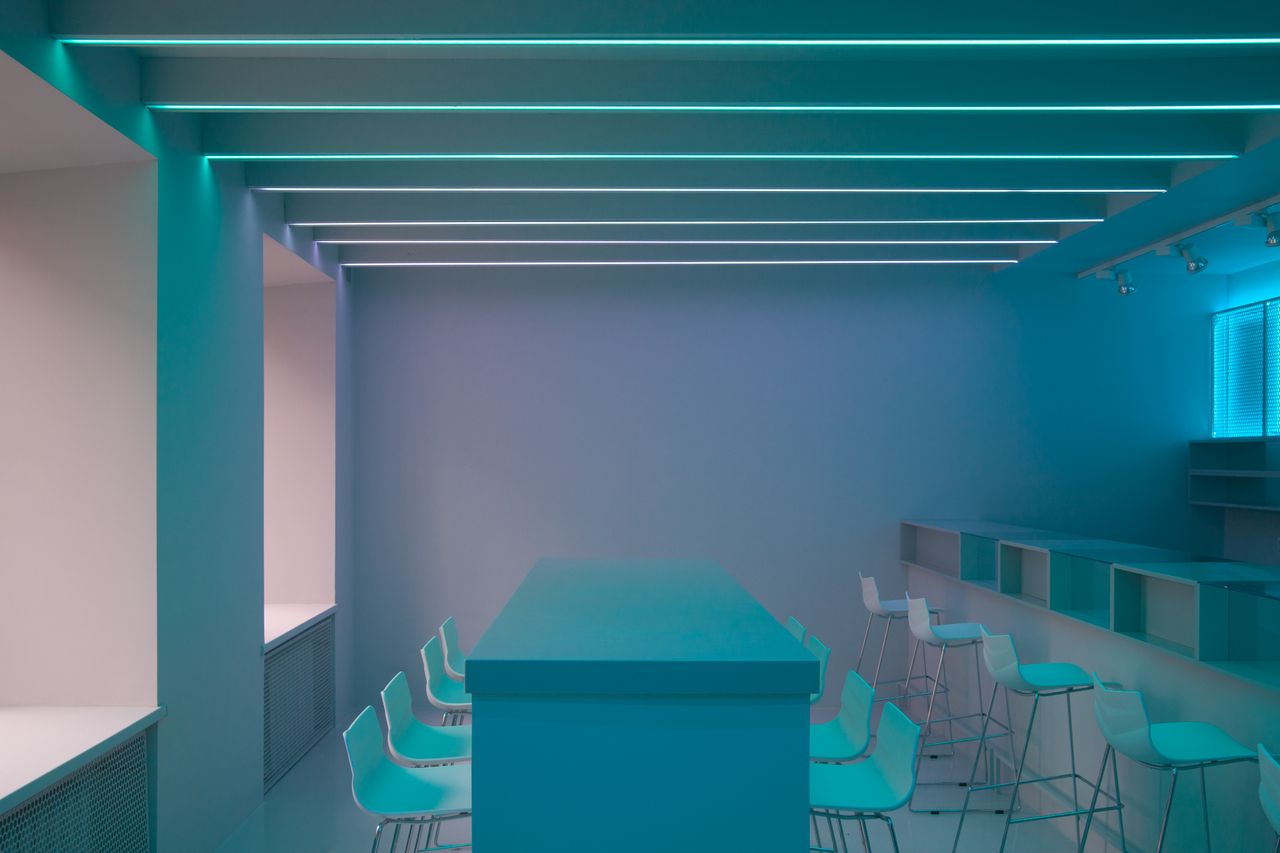 led-strip-lighting-garage LED strip lights glowing along the ceiling of a modern interior