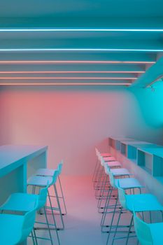 A minimalist room with white chairs and neon lights creating a futuristic ambiance.