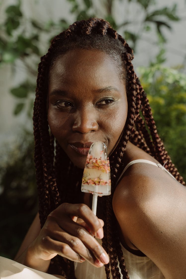 Woman Holding An Ice Pop