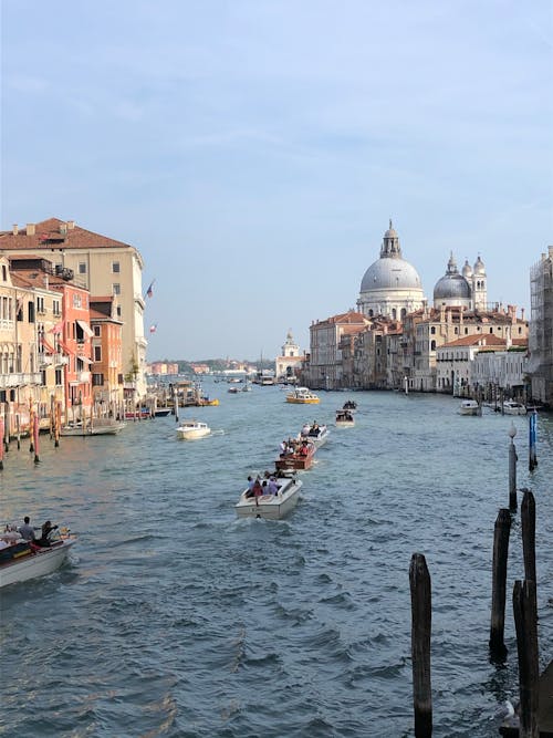 Boats Sailing Across Grand Canal in Venice, Italy