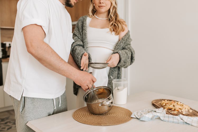 A Couple Cooking Together 