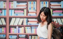 Woman With Brown Backpack