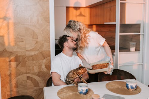 A Woman Kissing Man on Forehead