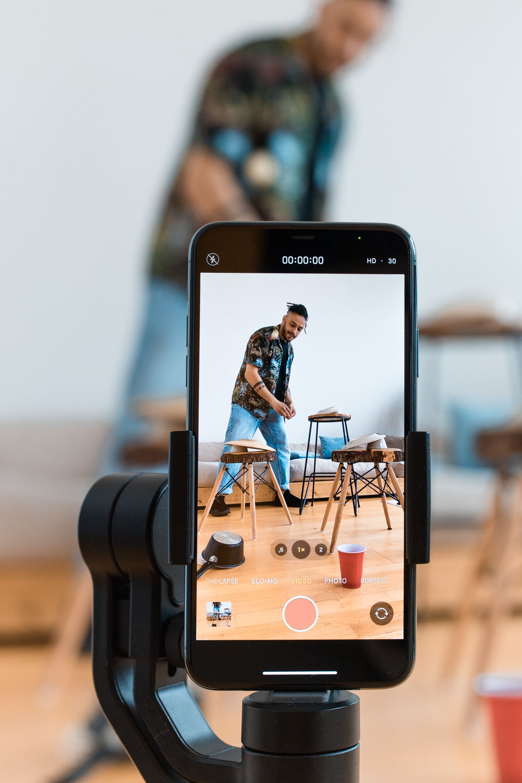 Content creator filming social media content with a camera