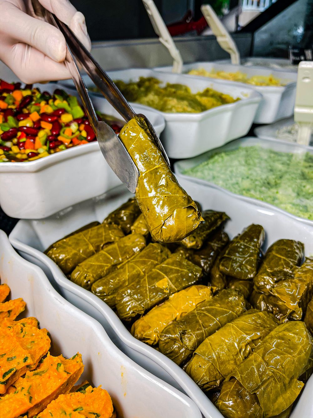 Stuffed grape leaves on a serving platter
