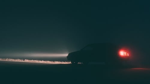 Car on the Road during Nighttime