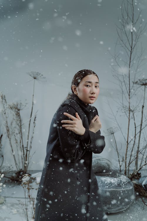 A Woman Wearing Black Coat 