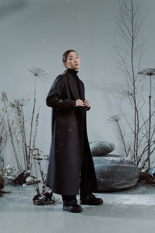 A Woman Wearing a Black Coat