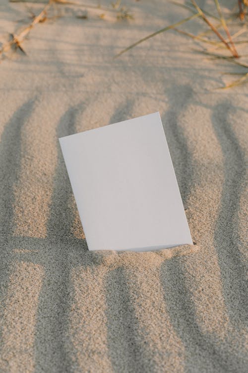An Empty Card on the Sand 