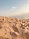 Brown Sand Under Blue Sky