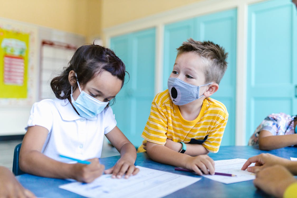 Free Kids Wearing Face Mask in School Stock Photo