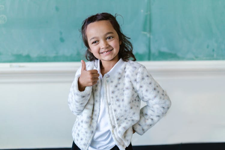 A Girl Doing A Thumbs Up