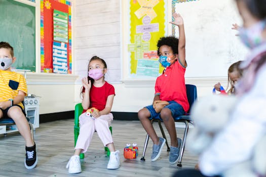 Children wearing masks participate actively in a vibrant classroom setting.