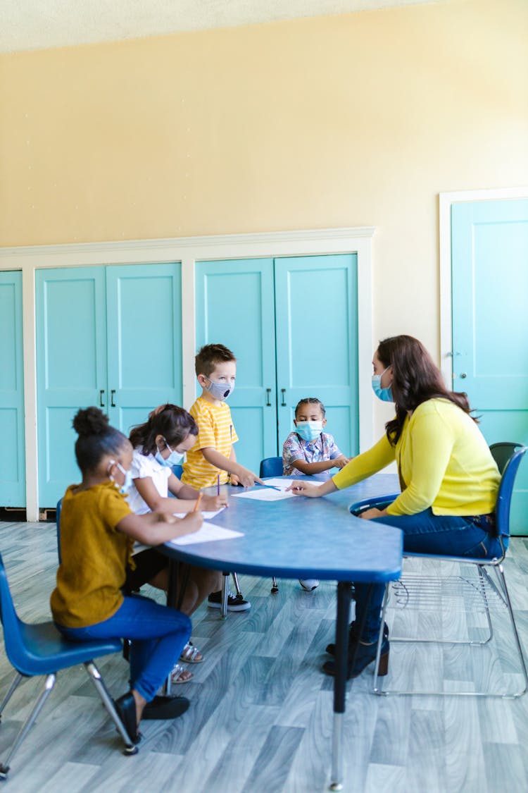 Teacher In Front Of Her Students