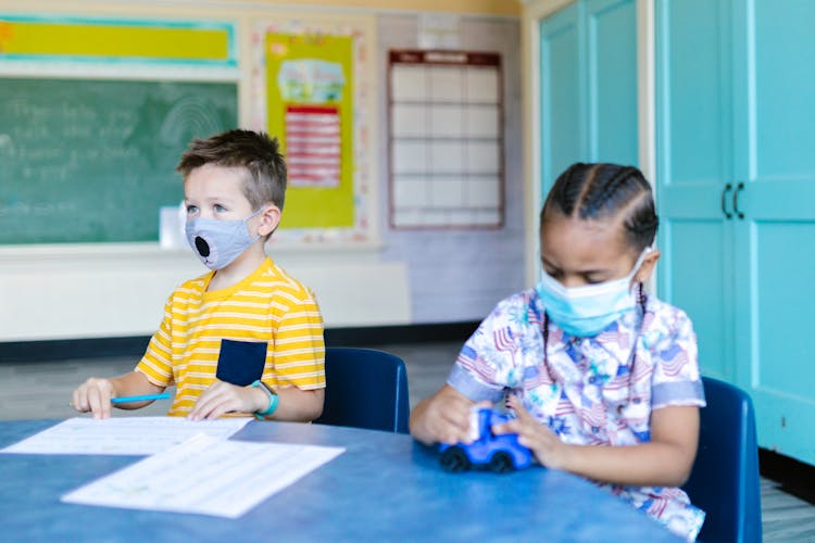 Kindergarten Children In The School Classroom